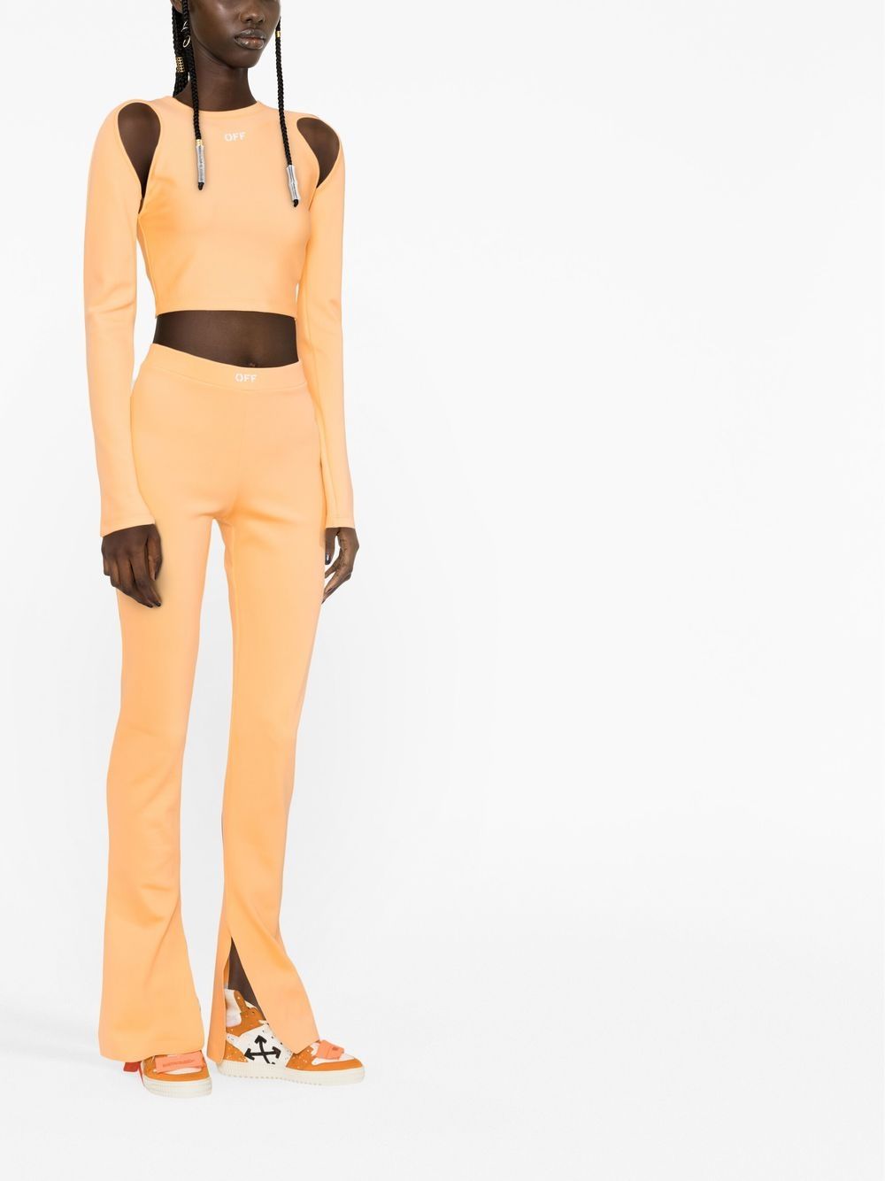Off White Sleek Cut Out Long Sleeved Crop Top Peach Orange
